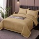 Lenjerie de pat dublu IMP17 din damasc policoton în nuanță maro V2, aranjată meticulos pe un pat într-un dormitor modern cu elemente de design elegante, invitând la relaxare și confort pentru un somn odihnitor.