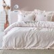 Lenjerie de pat premium din satin de lux, model Lina Beige, cu broderie handmade elegantă, pentru un decor sofisticat.