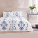 Set de pat Vega din bumbac 100% cu design modern în culori galben, portocaliu și gri, într-un dormitor luminos și stilat