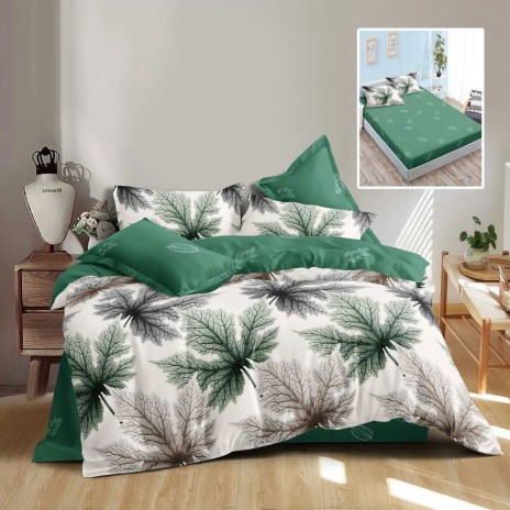 Lenjerie finet alba cu imprimeu frunze smarald si cearceaf verde, asezata pe pat modern
