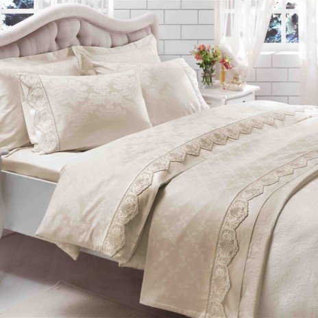 Lenjerie de pat Artois din bumbac 100% dublu satinat crem cu design elegant și broderie fină.