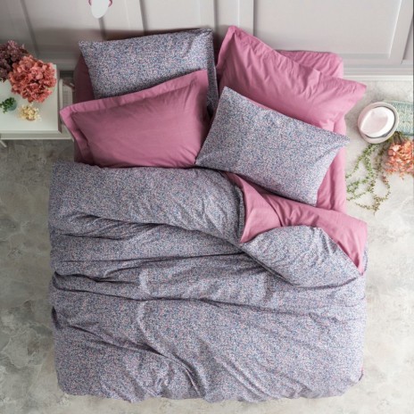 Lenjerie de pat din bumbac 100% ranforce, de la Cotton Box, model Penny Roz, cu design floral delicat în nuanțe de roz și albastru deschis.