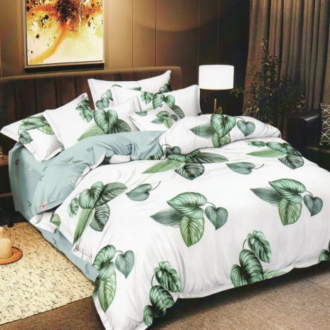 Lenjerie de pat cu frunze verzi pe fundal alb, oferta lenjerii de pat 1+1 gratis.